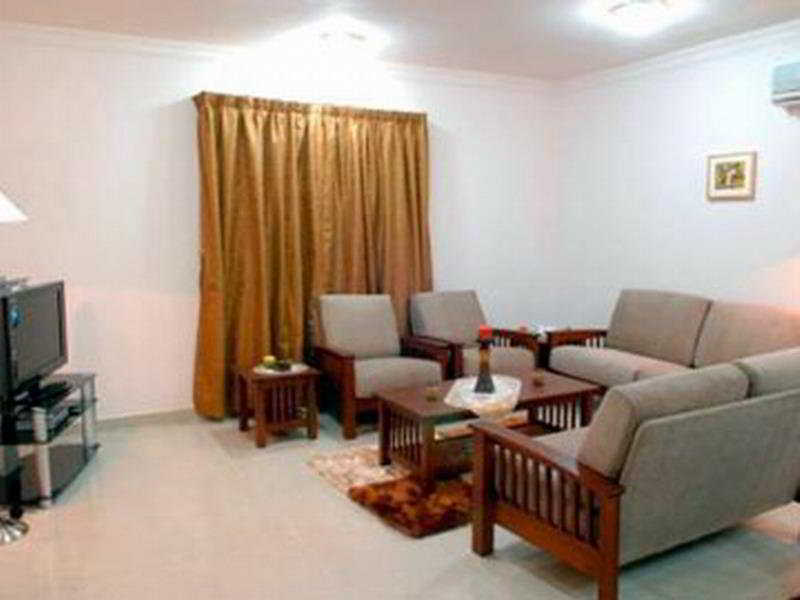 La Villa Inn Hotel Apartments Doha Quarto foto